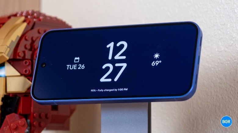 Google Pixel 10 attached to a Qi2 charger