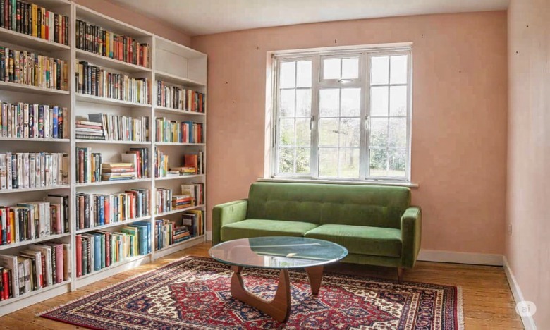A watermarked AI image of a room with furniture in it.